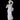 Large marble sculpture of a woman with flowers at her feet