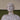 Large marble sculpture of a woman, wheat ears, and flower basket