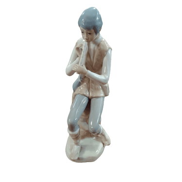 Figura de porcelana española Casades años 70 'niño con flauta' Bucarest Art & Antiques