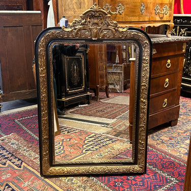 French mirror Napoleon III ebonized wood and gilt 'à parcs clos'