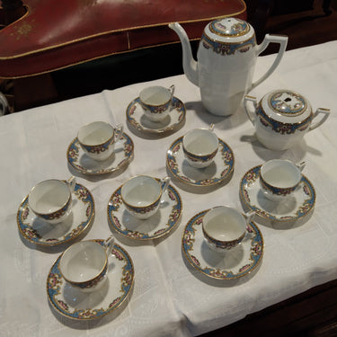 Juego de tazas de té porcelana francesa Limoges 8 personas apliqué azul y amarillo Bucarest Art Gallery